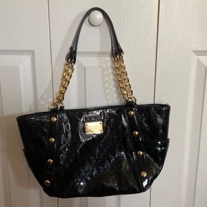 Black Leather Michael Kors Purse with Gold Chain.